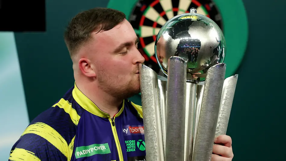 2026-01-03T222149Z_115082018_UP1EM131Q4B1X_RTRMADP_3_DARTS-BRITAIN